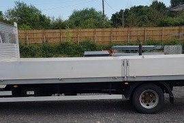 Isuzu NPR 7 drop side truck